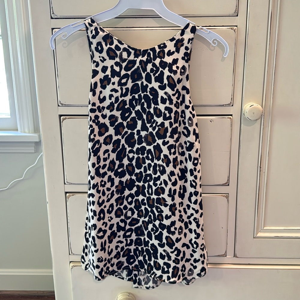 ALC 100% silk animal print sleeveless top. Button back